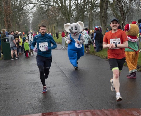 Runners and costumed characters at the Edinburgh Christmas run